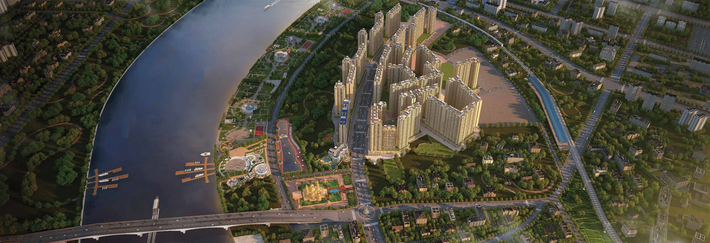 Panoramic aerial rendering of the township beside the river. Artist’s impression; not a completed-site photograph.